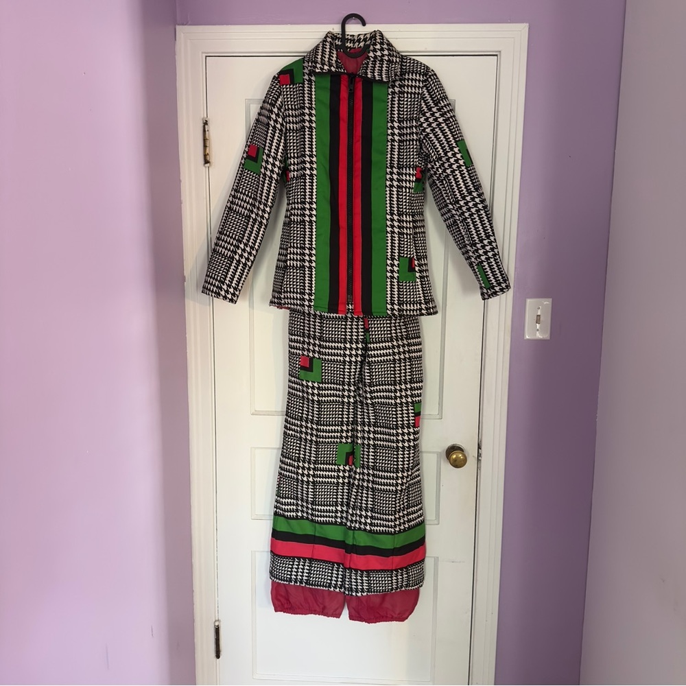 Vintage Black and White Checkered Ski Suit with Pink and Green Accents